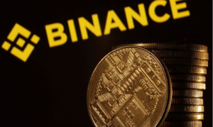 Binance and stack of gold coins