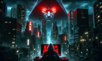 A dark, ominous cityscape with a large, glowing red "Akira" logo looming over the buildings, casting a sinister shadow. In the foreground, a hooded figure sits at a computer, their face illuminated by the screen's eerie red glow.