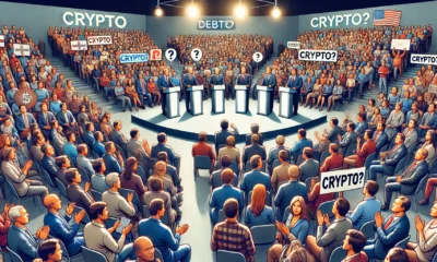 Crowded debate hall with audience, "Crypto?" sign held up in crowd